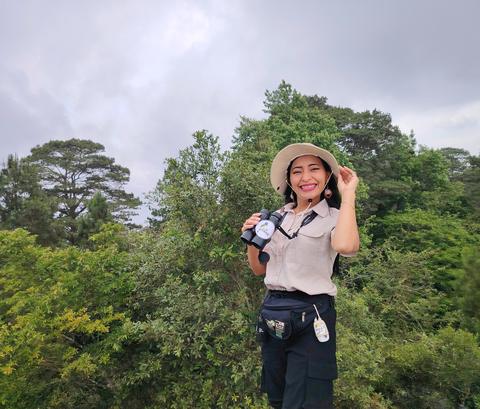A guide at a mountain viewpoint