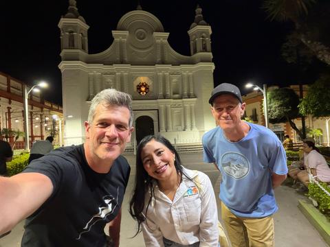 A night selfie in front of a lit church