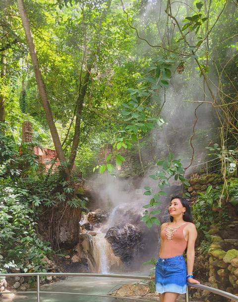 A person at a hot spring pool