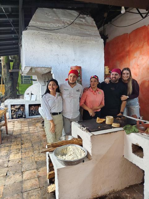 A group in a traditional kitchen