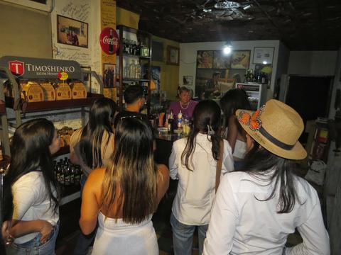 A group visiting a shop