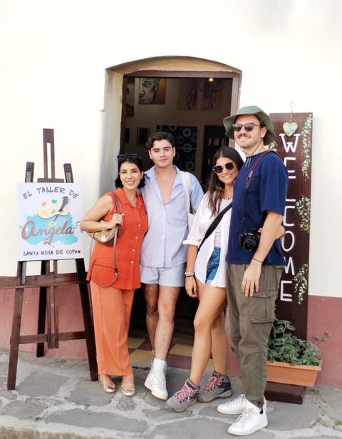 A group at the entrance of a café
