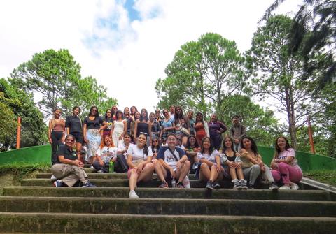 A large group sitting on steps