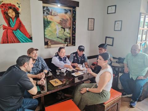 A group chatting in a café