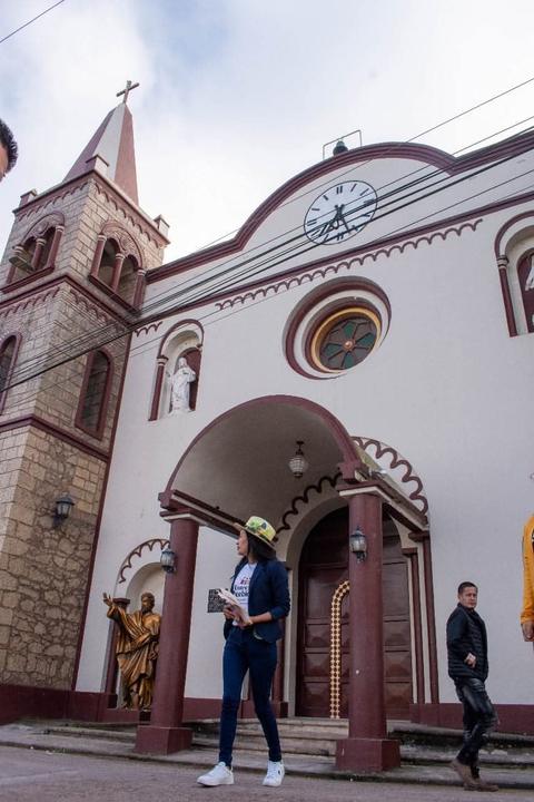Visitors in front of a church